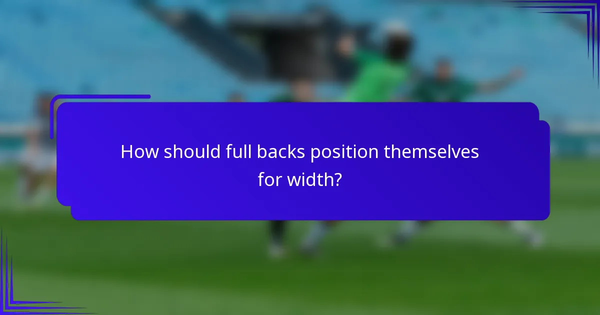 How should full backs position themselves for width?