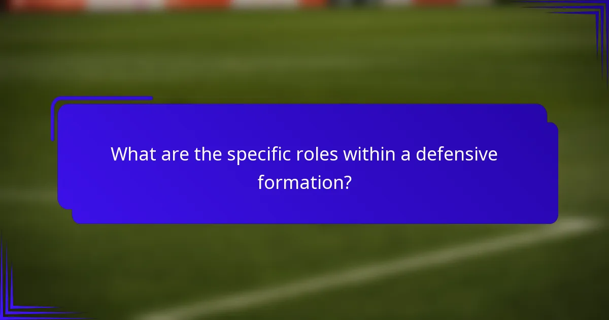 What are the specific roles within a defensive formation?
